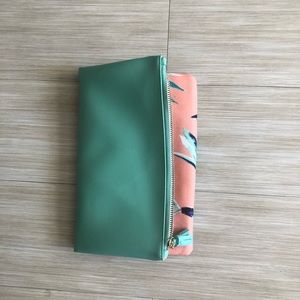 Brand new never used Rachel Pally Reversible Clutch